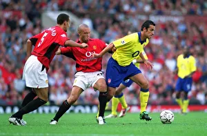 Edu (Arsenal) Mikael Silvestre and Rio Ferdinand (Manchester United) Edu (Arsenal) Mikael Silvestre and Rio Ferdinand (Manchester United)
