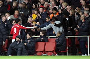 Eduardo (Arsenal) shakes hands with Cesc Fabregas Eduardo (Arsenal) shakes hands with Cesc Fabregas