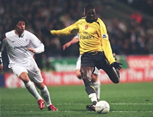 Emmanuel Adebayor breaks past Bolton defender Ivan Campo to score the 1st Arsenal goal Emmanuel Adebayor breaks past Bolton defender Ivan Campo to score the 1st Arsenal goal