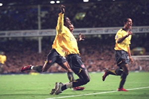 Emmanuel Adebayor celebrates scoring Arsenals goal with Armand Traore Emmanuel Adebayor celebrates scoring Arsenals goal with Armand Traore