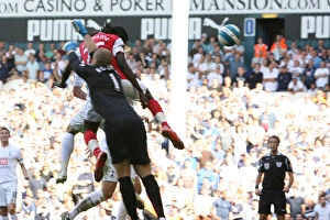 Emmanuel Adebayor heads past Tottenham goalkeeper Paul Robinson to score the 1st Arsenal Emmanuel Adebayor heads past Tottenham goalkeeper Paul Robinson to score the 1st Arsenal