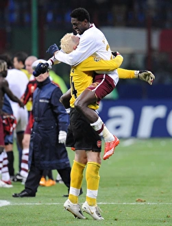 Emmanuel Adebayor and Manuel Almunia celebrate Arsenals victory Emmanuel Adebayor and Manuel Almunia celebrate Arsenals victory