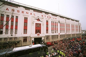 Fans gather outside the East Stand on Avenell Road to watch the Arsenal team entre the stadium Fans gather outside the East Stand on Avenell Road to watch the Arsenal team entre the stadium