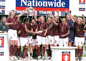 Faye White lifts the FA Cup Trophy for the Arsenal Ladies Faye White lifts the FA Cup Trophy for the Arsenal Ladies