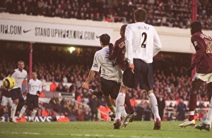 Gilberto scores Arsenals gial under pressure from Tal Ben Haim (Bolton) Gilberto scores Arsenals gial under pressure from Tal Ben Haim (Bolton)