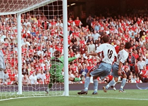 Gilberto scores Arsenals goal past Thomas Sorensen (Villa) Gilberto scores Arsenals goal past Thomas Sorensen (Villa)