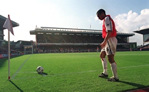Giovanni van Bronckhorst (Arsenal) prepares to take a corner Giovanni van Bronckhorst (Arsenal) prepares to take a corner