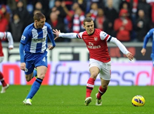 Jack Wilshere (Arsenal) James McCarthy (Wigan). Wigan Athletic 0:1 Arsenal. Barclays Premier League Jack Wilshere (Arsenal) James McCarthy (Wigan). Wigan Athletic 0:1 Arsenal. Barclays Premier League