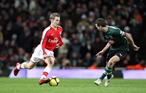 Jack Wilshere (Arsenal) Karl Duguid (Plymouth) Jack Wilshere (Arsenal) Karl Duguid (Plymouth)