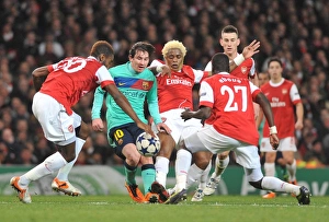 Johan Djourou, Alex Song and Emmanuel Eboue (Arsenal) Lionel Messi (Barcelona) Johan Djourou, Alex Song and Emmanuel Eboue (Arsenal) Lionel Messi (Barcelona)