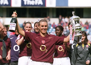 Julie Fleeting lifts the FA Cup Trophy for the Arsenal Ladies Julie Fleeting lifts the FA Cup Trophy for the Arsenal Ladies