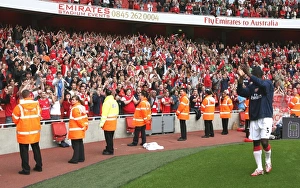 Kolo Toure waves to the Bergkamp Gallery after the match Kolo Toure waves to the Bergkamp Gallery after the match