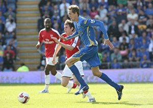 Mark Randall (Arsenal) Peter Crouch (Portsmouth) Mark Randall (Arsenal) Peter Crouch (Portsmouth)