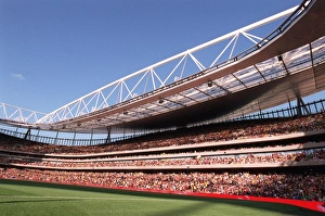 A mexican wave goes around Emirates Stadium, east side A mexican wave goes around Emirates Stadium, east side