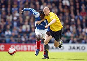 Phillipe Senderos (Arsenal) Benjani (Portsmouth) Phillipe Senderos (Arsenal) Benjani (Portsmouth)