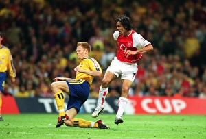 Robert Pires shoots past Southampton defender Michael Svensson to score the Arsenal goal Robert Pires shoots past Southampton defender Michael Svensson to score the Arsenal goal