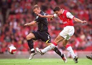 Robin van Persie (Arsenal) Jay Demerit (Watford) Robin van Persie (Arsenal) Jay Demerit (Watford)