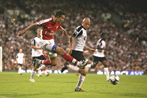 Robin van Persie (Arsenal) Paul Konchesky (Fulham) Robin van Persie (Arsenal) Paul Konchesky (Fulham)