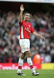 Robin van Persie (Arsenal) waves to his family after the match Robin van Persie (Arsenal) waves to his family after the match