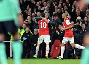 Robin van Persie celebrates scoring Arsenals 1st goal with Arsenal Manager Arsene Wenger Robin van Persie celebrates scoring Arsenals 1st goal with Arsenal Manager Arsene Wenger