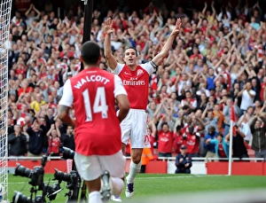 Robin van Persie celebrates scoring his and Arsenals 2nd goal, his 100th goal for Arsenal with Theo Walcott Robin van Persie celebrates scoring his and Arsenals 2nd goal, his 100th goal for Arsenal with Theo Walcott