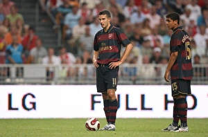 Robin van Persie and Denilson (Arsenal) Robin van Persie and Denilson (Arsenal)