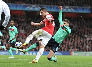 Robin van Persie shoots past Barcelona goalkeeper Victor Valdes to score the 1st Arsenal goal Robin van Persie shoots past Barcelona goalkeeper Victor Valdes to score the 1st Arsenal goal