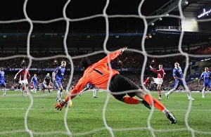 Robin van Persie shoots past Chelsea goalkeeper Petr Robin van Persie shoots past Chelsea goalkeeper Petr