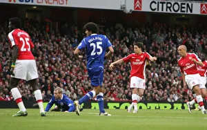 Samir Nasri shoots past Everton goalkeeper Tim Howard Samir Nasri shoots past Everton goalkeeper Tim Howard