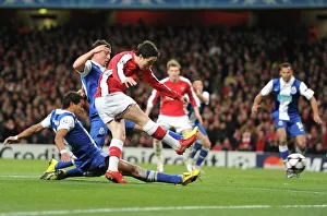 Samir Nasri shoots past Porto goalkeeper Helton to score the 3rd Arsenal goal Samir Nasri shoots past Porto goalkeeper Helton to score the 3rd Arsenal goal