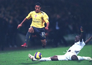 Theo Walcott (Arsenal) Abdoulaye Faye (Bolton) Theo Walcott (Arsenal) Abdoulaye Faye (Bolton)