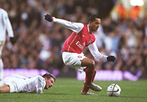 Theo Walcott (Arsenal) Teemu Tainio (Spurs) Theo Walcott (Arsenal) Teemu Tainio (Spurs)