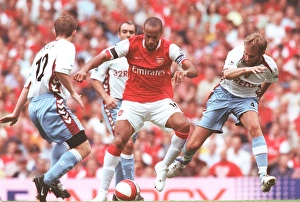 Thierry Henry (Arsenal) Olof Mellberg (Villa) Thierry Henry (Arsenal) Olof Mellberg (Villa)