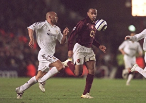 Thierry Henry (Arsenal) Raul Bravo (Real Madrid) Thierry Henry (Arsenal) Raul Bravo (Real Madrid)