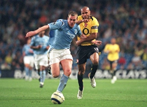 Thierry Henry (Arsenal) Richard Dunne (Man City). Manchester City 1:3 Arsenal Thierry Henry (Arsenal) Richard Dunne (Man City). Manchester City 1:3 Arsenal