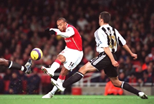 Thierry Henry (Arsenal) Steven Taylor (Newcastle) Thierry Henry (Arsenal) Steven Taylor (Newcastle)