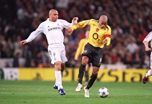 Thierry Henry beats Ronaldo (Real) on his way to scoring Arsenals goal Thierry Henry beats Ronaldo (Real) on his way to scoring Arsenals goal