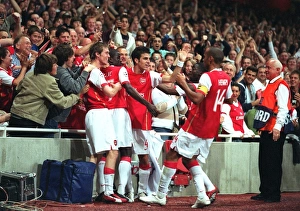 Thierry Henry celebrates scoring Arsenals 1st goal with Emmanuel Eboue Thierry Henry celebrates scoring Arsenals 1st goal with Emmanuel Eboue