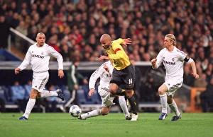 Thierry Henry goes away from Ronaldo and Guti (Real) on his way to scoring Arsenals goal Thierry Henry goes away from Ronaldo and Guti (Real) on his way to scoring Arsenals goal