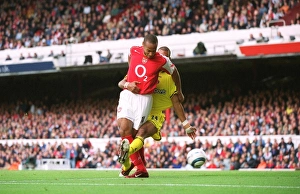 Thierry Henry scores his 1st goal (Arsenals 2nd) under pressure from Jonathan Fortune Thierry Henry scores his 1st goal (Arsenals 2nd) under pressure from Jonathan Fortune