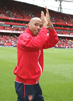 Thierry Henry waves to the Arsenal fans before the match Thierry Henry waves to the Arsenal fans before the match