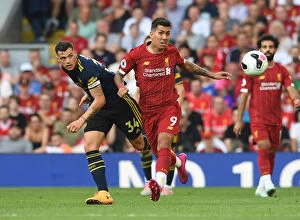 Images Dated 24th August 2019: Xhaka vs Firmino: Intense Clash Between Liverpool and Arsenal in Premier League