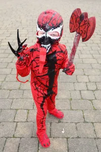 4 year old Carnage takes on Spiderman at MCM London Comic Con, Excel, London 4 year old Carnage takes on Spiderman at MCM London Comic Con, Excel, London