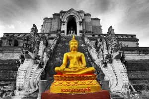 Gold Buddha statue at the Wat Chedi Luang temple, Chiang Mai, Thailand Gold Buddha statue at the Wat Chedi Luang temple, Chiang Mai, Thailand