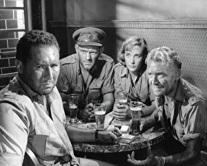 A moment from the final sequence of Ice Cold In Alex (1957) A moment from the final sequence of Ice Cold In Alex (1957)