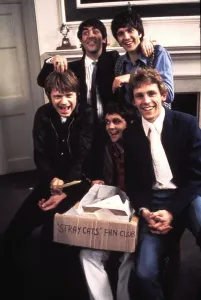 Actors And Musician Prints: David Essex and Keith Moon in a scene from Stardust, 1974 Print