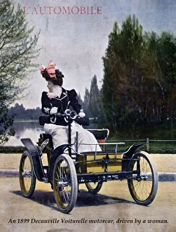An 1899 Decauville Voiturelle motorcar driven by a woman