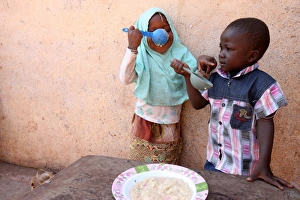 African family living in a poor district of Bamako African family living in a poor district of Bamako