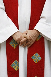 Catholic priest dressed for mass Catholic priest dressed for mass