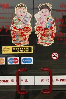 Chinese New Year stickers outside a bank Chinese New Year stickers outside a bank